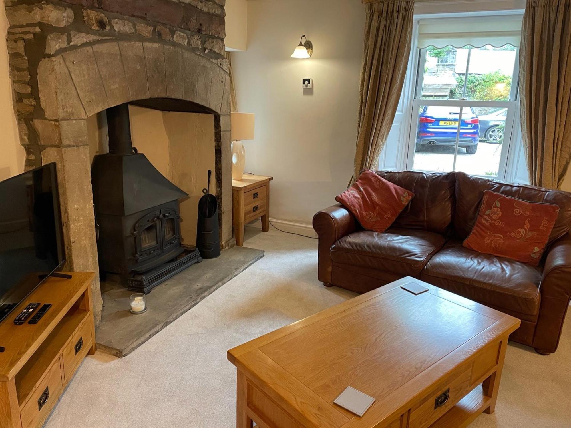 Ashfield House Hotell Grassington Rom bilde The living room at The Old Post Office