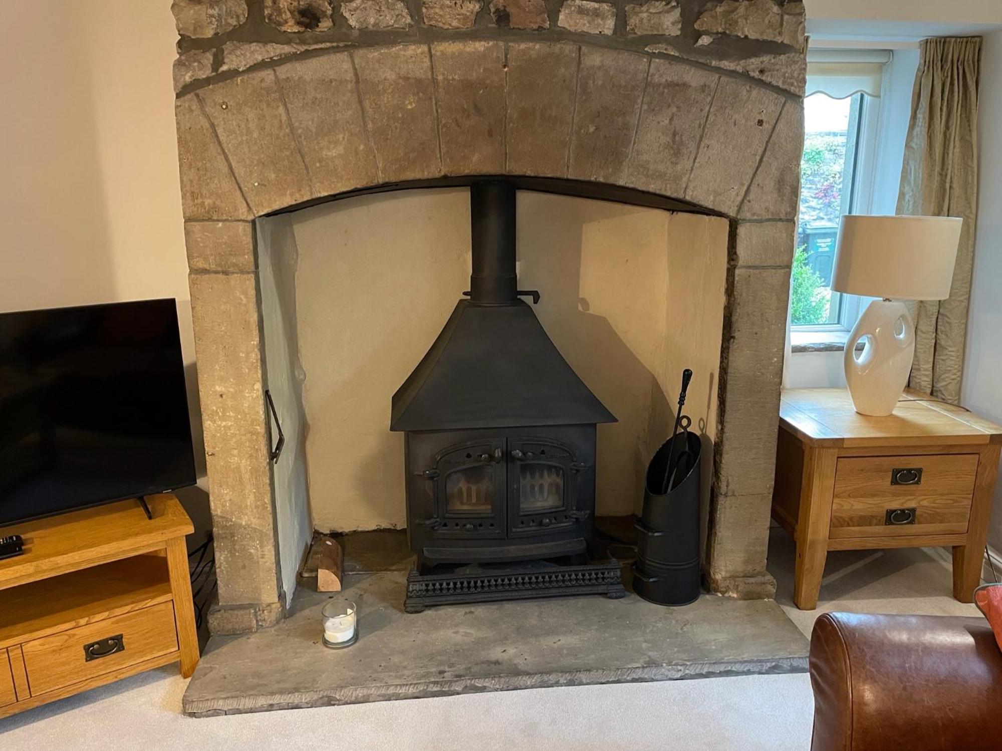 Ashfield House Hotell Grassington Rom bilde The fireplace in the living room
