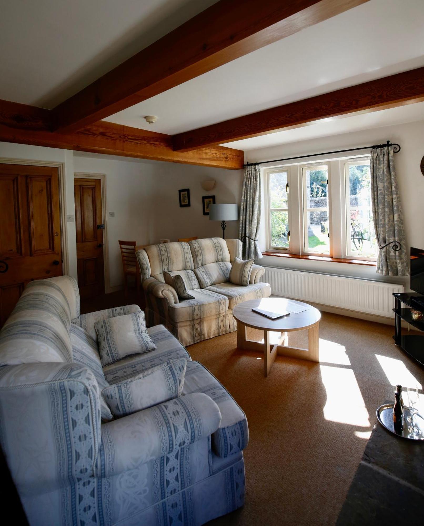 Ashfield House Hotell Grassington Rom bilde The living room at The Old School House